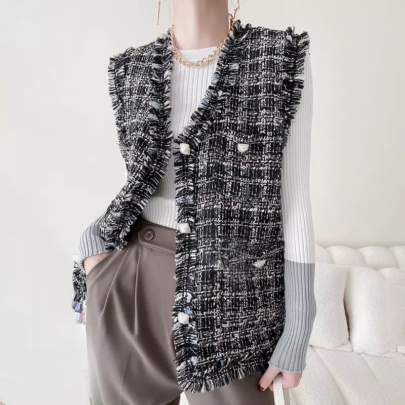 Tweed sleeveless coat