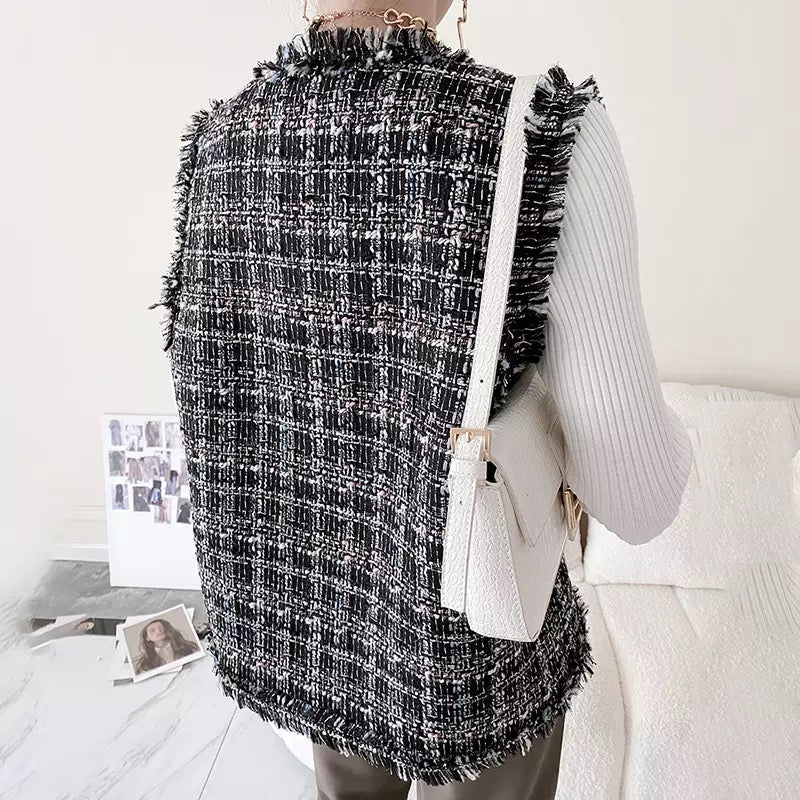 Tweed sleeveless coat