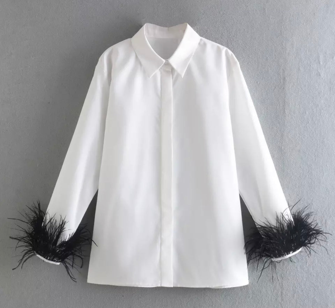 Feather cuff blouse