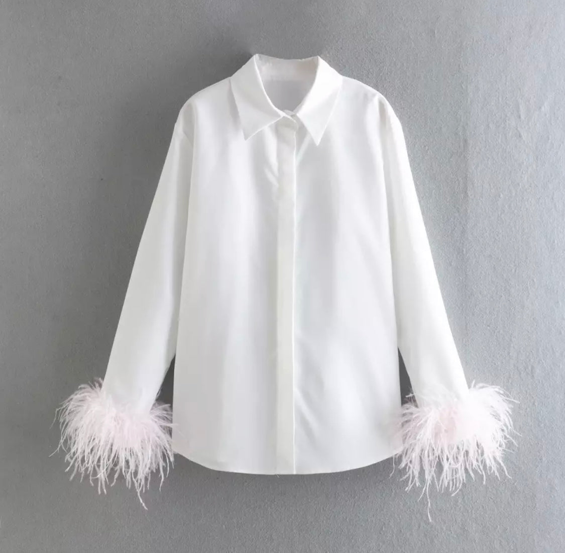 Feather cuff blouse